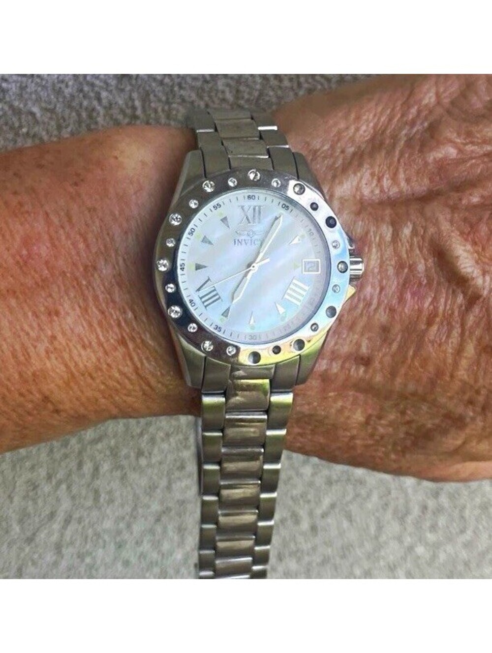 Invicta Angel Women's Quartz Watch White Dial Roman Date Silver Bracelet 100m
